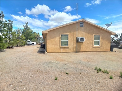 View of home's exterior featuring stucco siding an