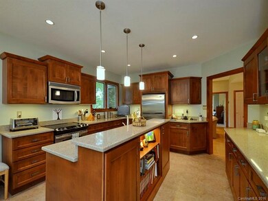 A Cook's Kitchen with Stainless Steel Appliances a