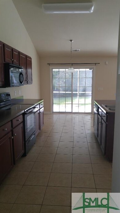 Kitchen and eat-in breakfast area