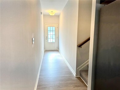 Doorway to outside with stairway, wood finished fl