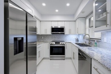 11335 Twelve Oaks Way, North Palm Beach, FL 33408 - photo 5