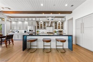 Kitchen featuring wall chimney exhaust hood, frees