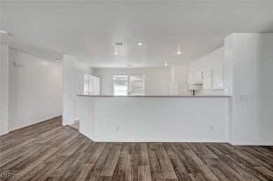 Unfurnished living room with dark wood-style floor
