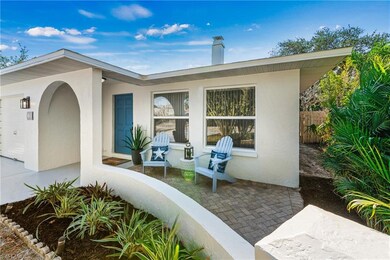 Entry with upgraded patio with custom pavers.