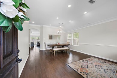 Upon entering, this home features high ceilings, meticulously maintained tile flooring throughout the main living spaces, and tons of natural light!