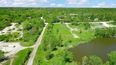 The BENEFIT of this lake front lot Ann A