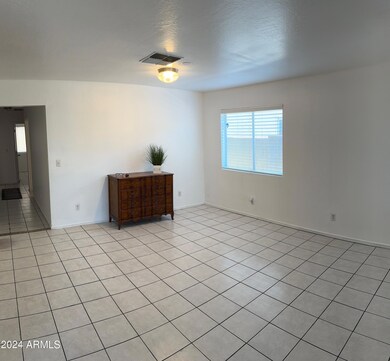 Great Room to Hall Open to Kitchen