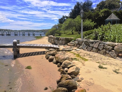 The fine sand beach is inviting for picnics and a swim.