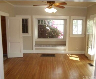 Formal dining room with charming window seat.