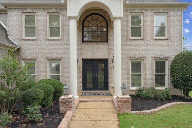 Entrance to property featuring french doors