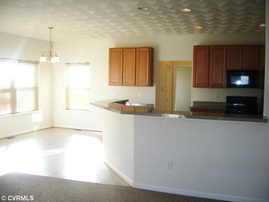 Kitchen - Open and flowing floor plan from the Gre