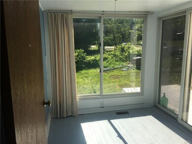 Indoor front porch with plenty of light.