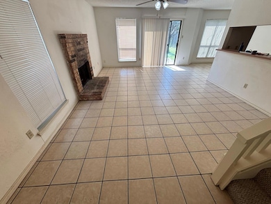 Unfurnished living room with light tile patterned