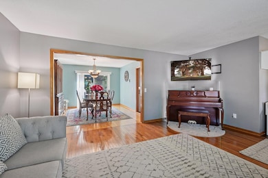 Living room opens into formal dining room