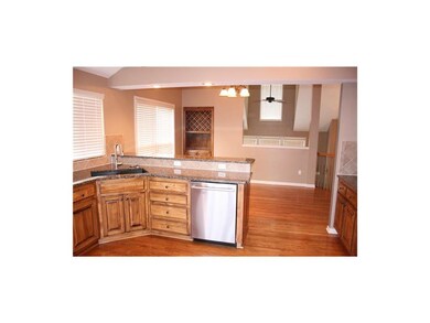 Kitchen with stainless appliances and granite coun