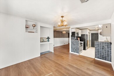 Dining area with some built in shelving.