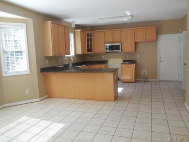 Eat-In Kitchen with Bay Window and Ceramic Tile Fl