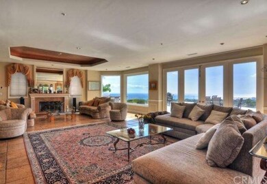 great room with sit-down ocean views and fireplace