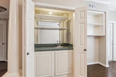 The wet bar is an extra bonus in this spacious uni