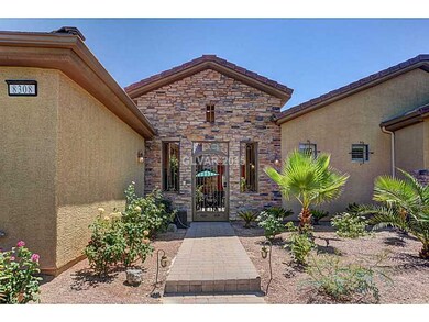 Property Photo. Brick paver sidewalk leads to an i