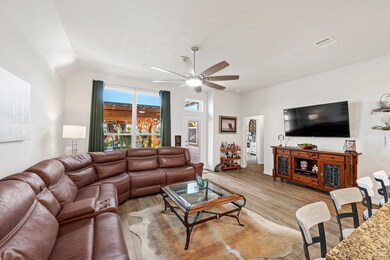 Living area with wood-finished flooring