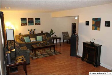 Large den on the main level with lots of natural l