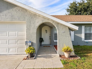 387 Iowa Woods Cir W, Orlando, FL 32824 - photo 2