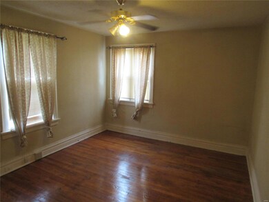MASTER BEDROOM WITH WOODEN FLOORS