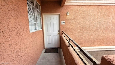 7701 Himalayas Ave unit 204, Las Vegas, NV 89128 - photo 2