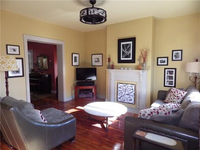 Original pine floors in living room and dining roo