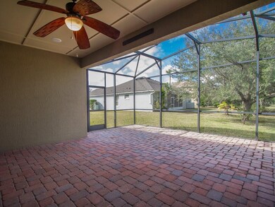Brick paved lanai with 24 x 12 Extended screened p