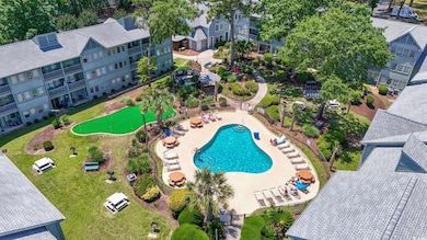 Drone / aerial view of a pool