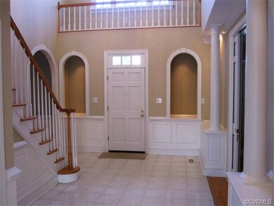 Gorgeous Two Story Entrance Foyer with Lighted Ves