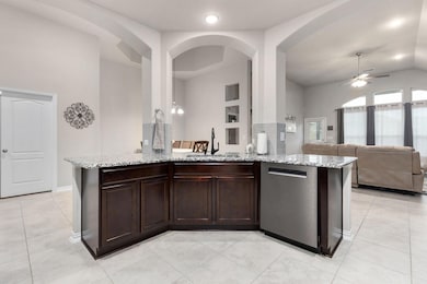Kitchen with a sink, stainless steel dishwasher, 