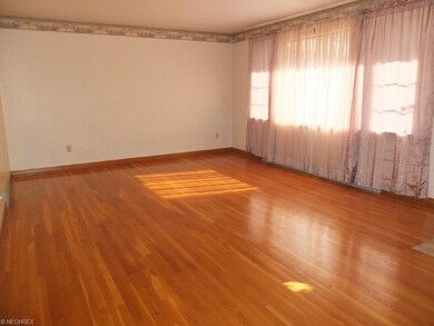 Spacious formal living room with a picture window 