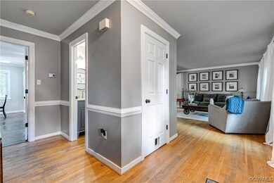 enter the home with half bath, closet, Living Room