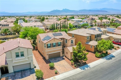 Aerial view of residential area featuring a mounta
