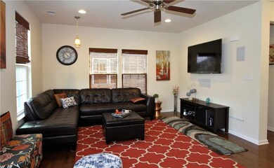 The light filled spacious family room features har