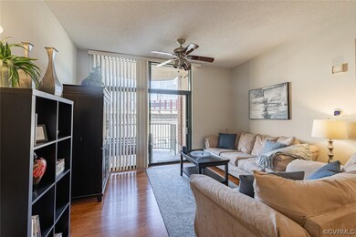 Living room with hardwood / wood-style flooring, c