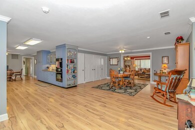 Dining room with light hardwood / wood-style floor