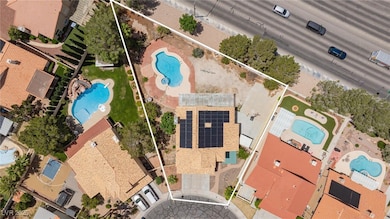 Aerial overview of property's location with a pool