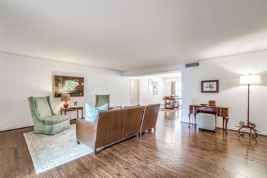 Living room with large windows and gorgeous hand s