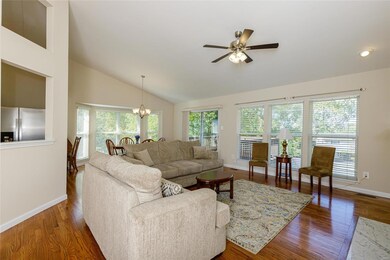 The great room has a pass-through to the kitchen a