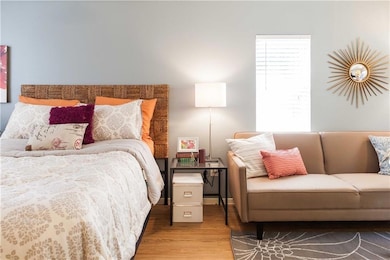 Bedroom featuring light wood-style flooring
