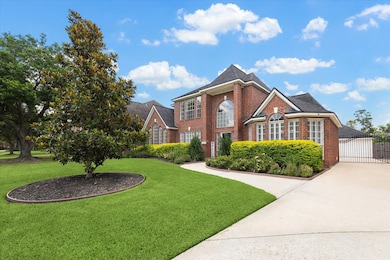 Oversized driveway provides abundant space for par