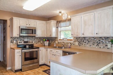 Updated kitchen with lots of cabinetry and a lazy Susan!