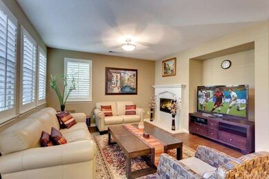 Spacious formal family room with cozy fireplace an