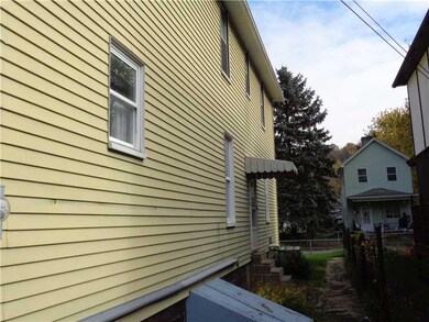 Exterior Front. Side of Home.  New electrical entr