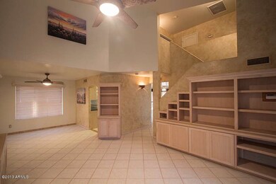 Living room with custom shelving