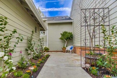 Guests pass through a garden-like setting providin